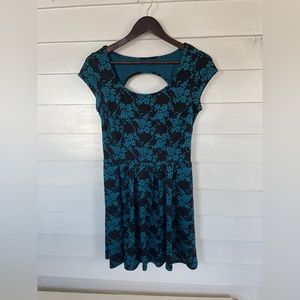 Black Paper Doll Skater Dress with Blue Floral Pattern